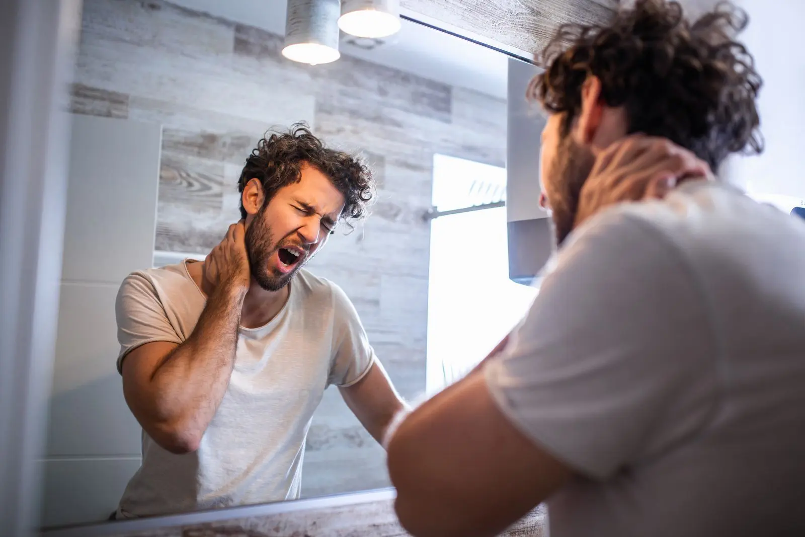 Man Struggling With Sleep Apnea