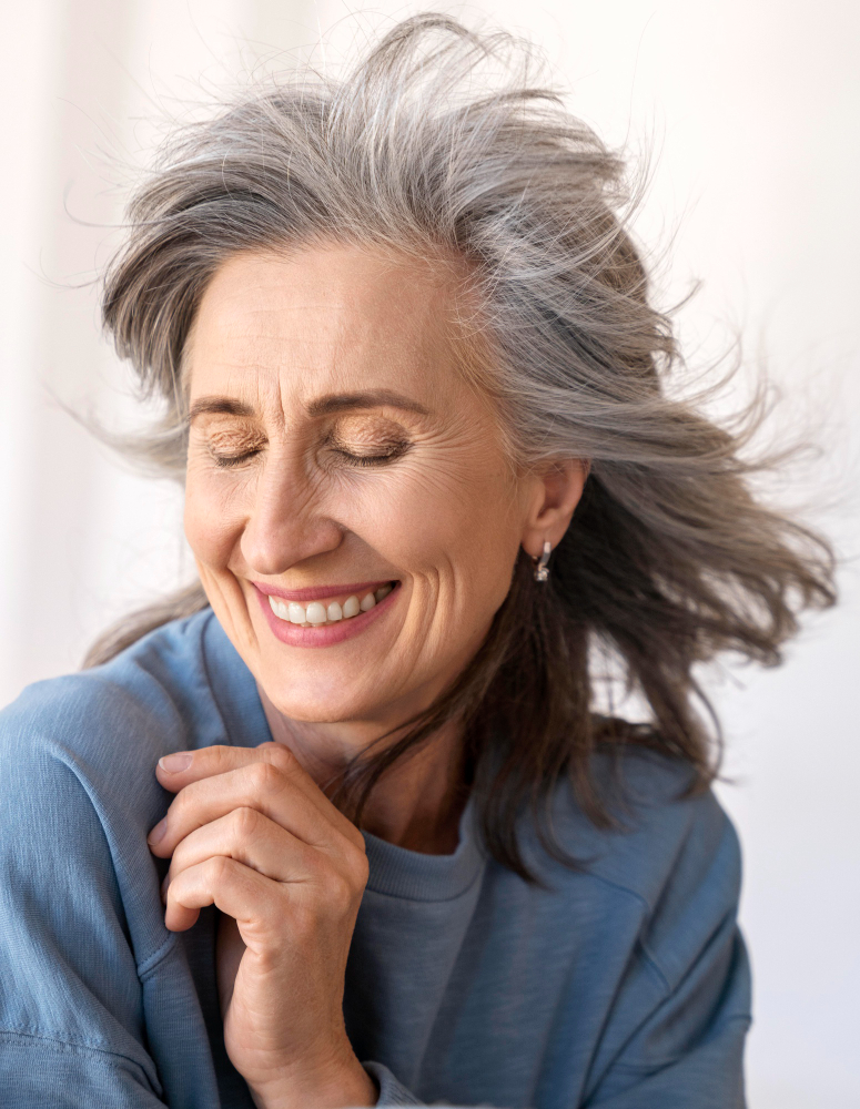 Old Woman Smiling With Implant Overdentures